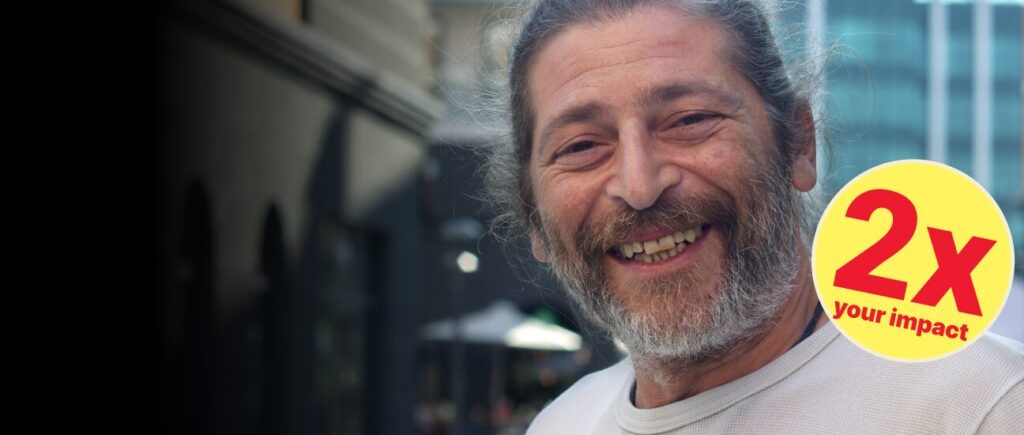 Smiling man supported by Souls Harbour Rescue Mission, featured in the July matching-gift campaign